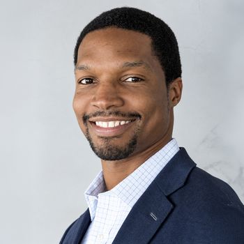Portrait of Alex Nettey, Associate Broker